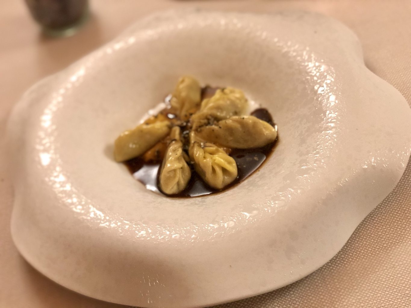 Culurgiones di pernice bianca, zucca di Samolaco alle spezie, sugo di pernice de Il Cantinone.