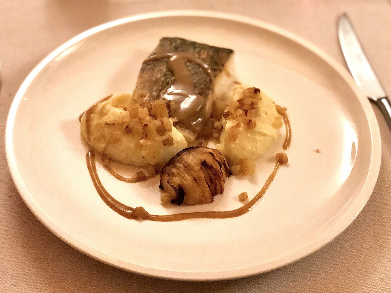 Luccio perca, caciucco di lago e patate di montagna de Il Cantinone.