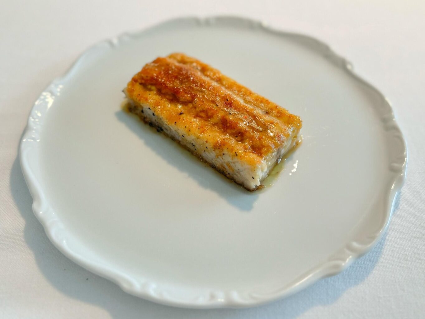 Anguilla, limone, aglio arrostito e peperoncino.