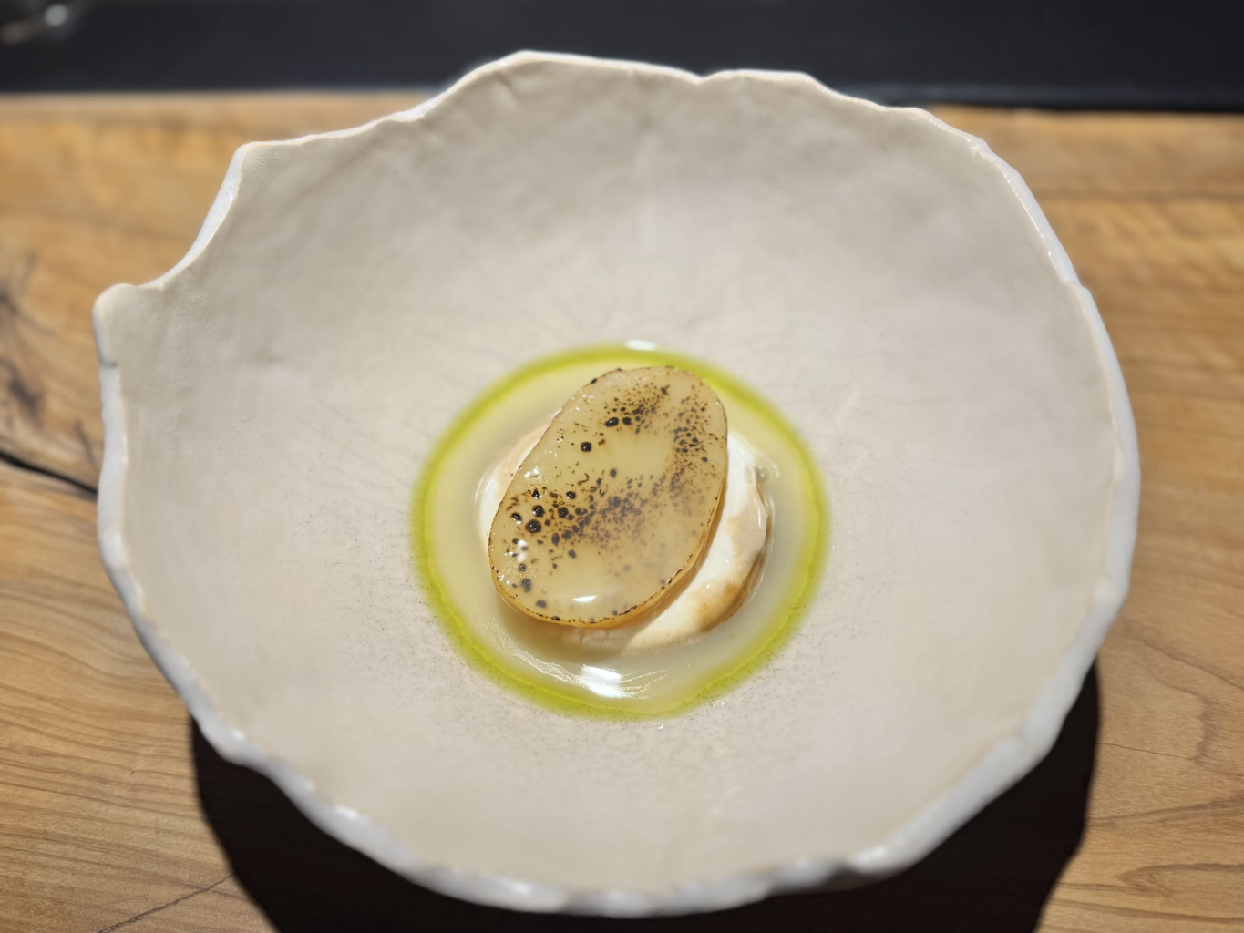 Patata arrosto, nocciola, yogurt, menta e caffè del ristorante Ausa
