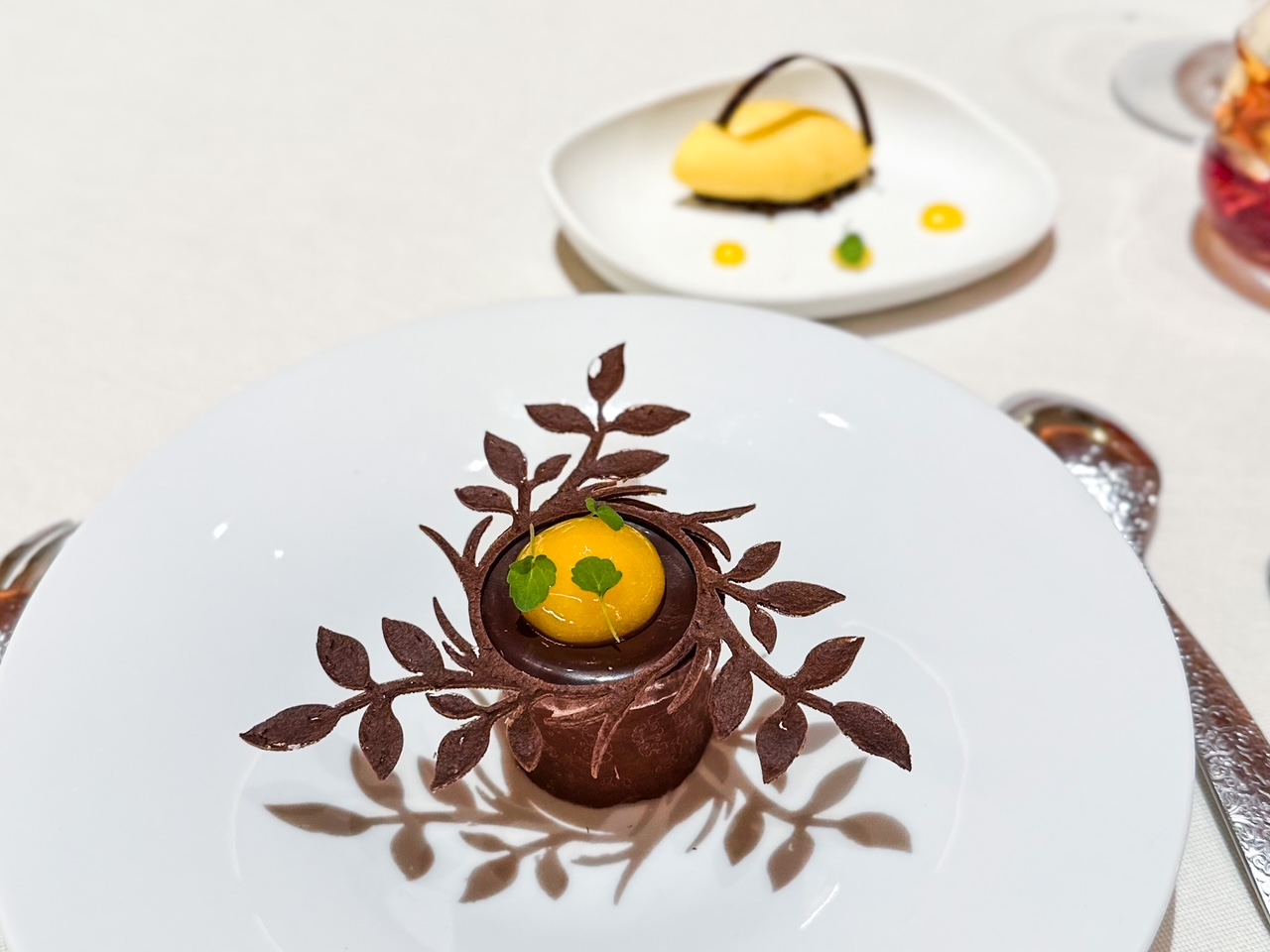 Zucchero al cioccolato, aria di cacao, arancia amara, Cointreau del ristorante 12 apostoli