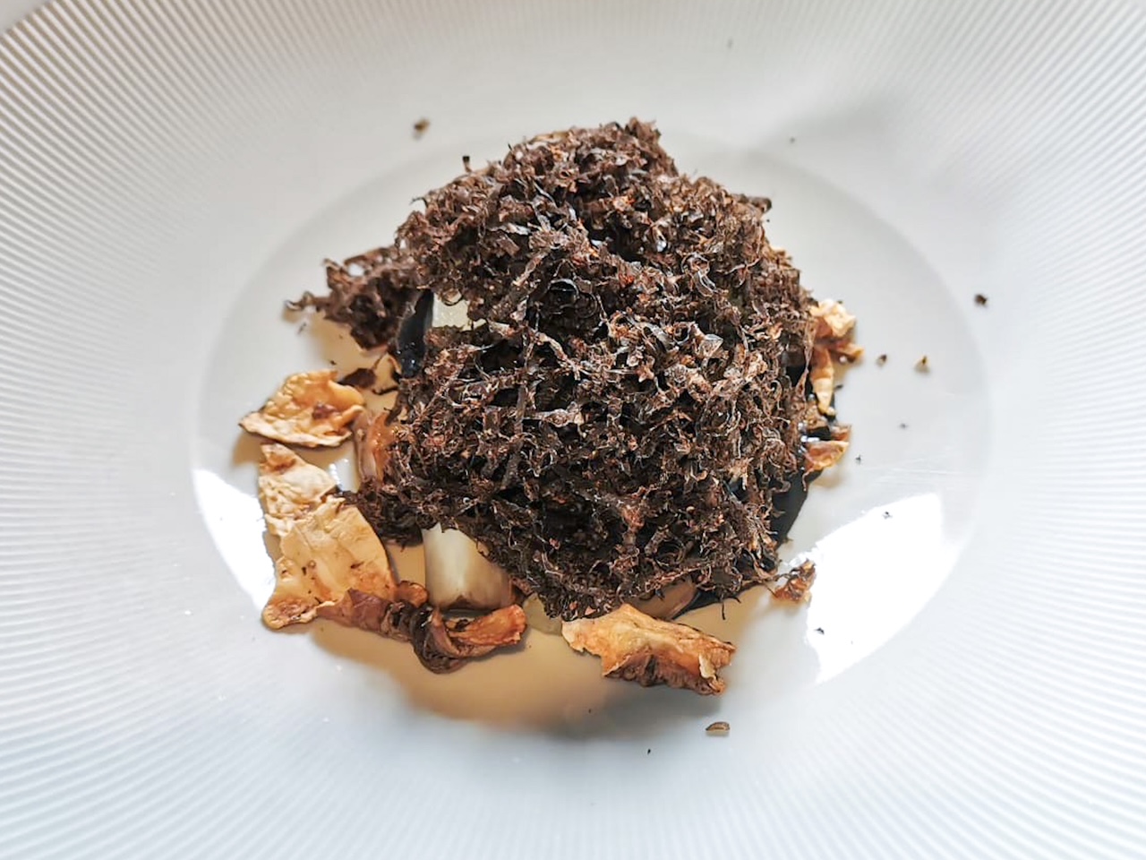 Gratin, topinambur e tartufo nero