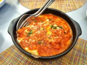Le Uova al pomodoro del ristorante Il Portico.