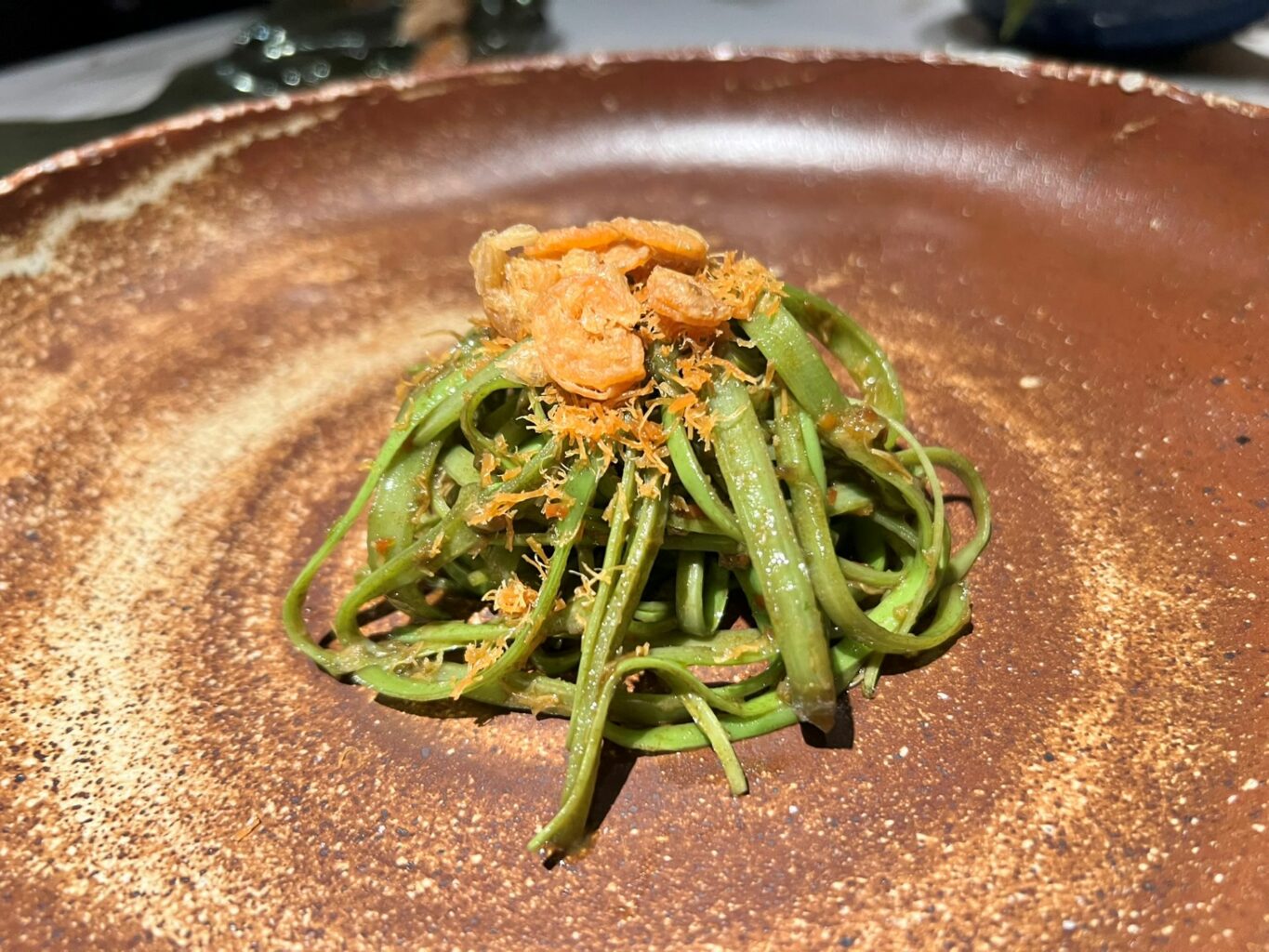Fegato di abalone, capesante e gamberi essiccati.