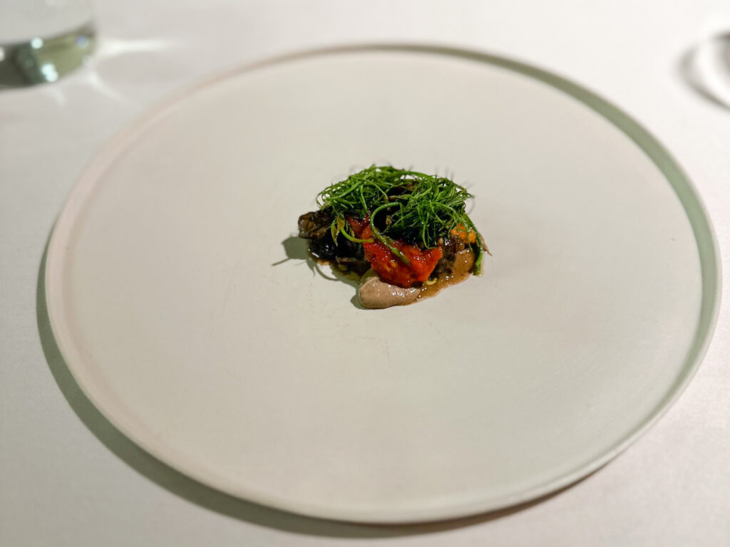 Lumache brasate e ricci di mare del Ristorante l'Argine a Vencò.