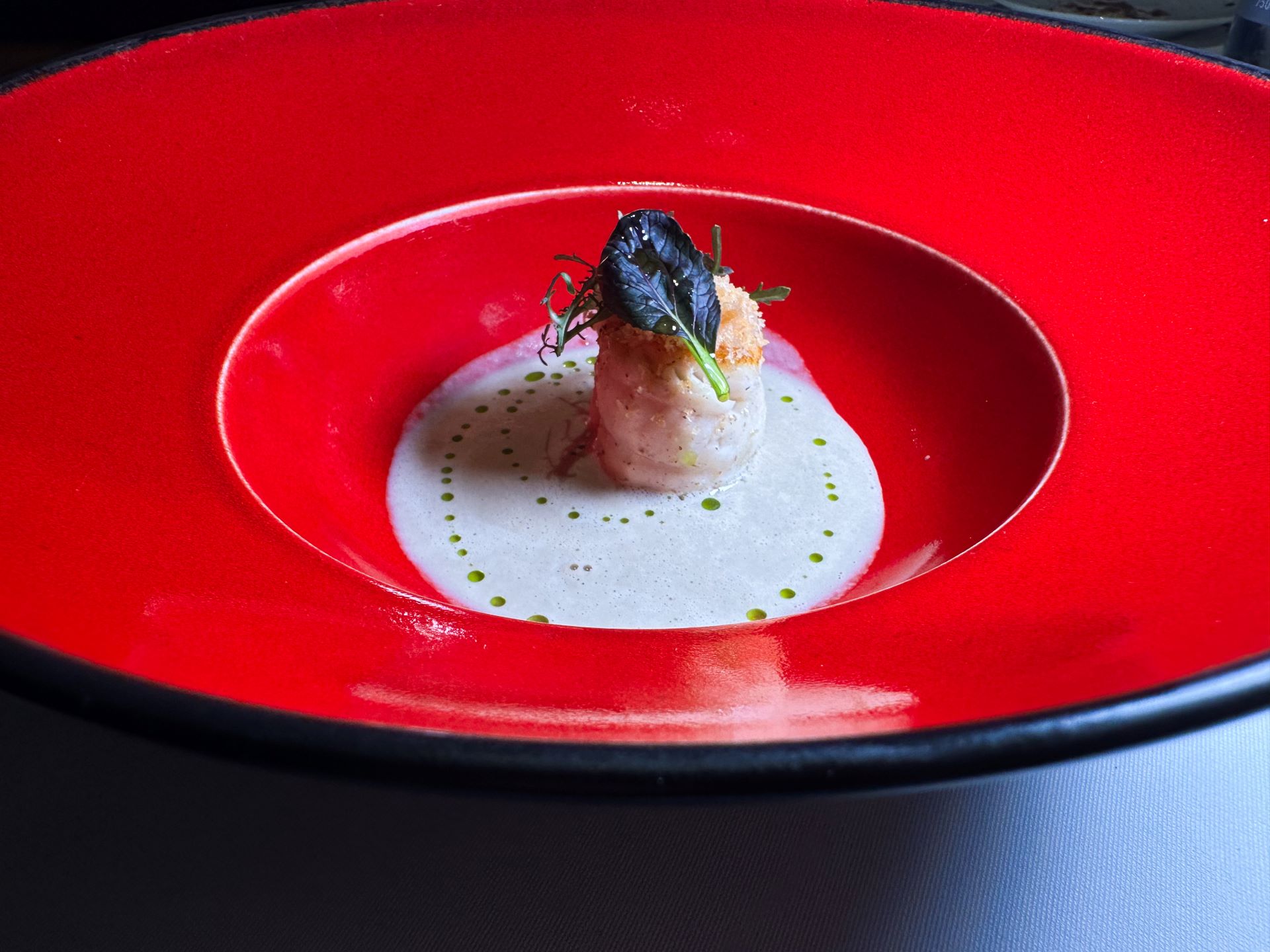 Sogliola al burro, emulsione di sogliola, le sue interiora e funghi.