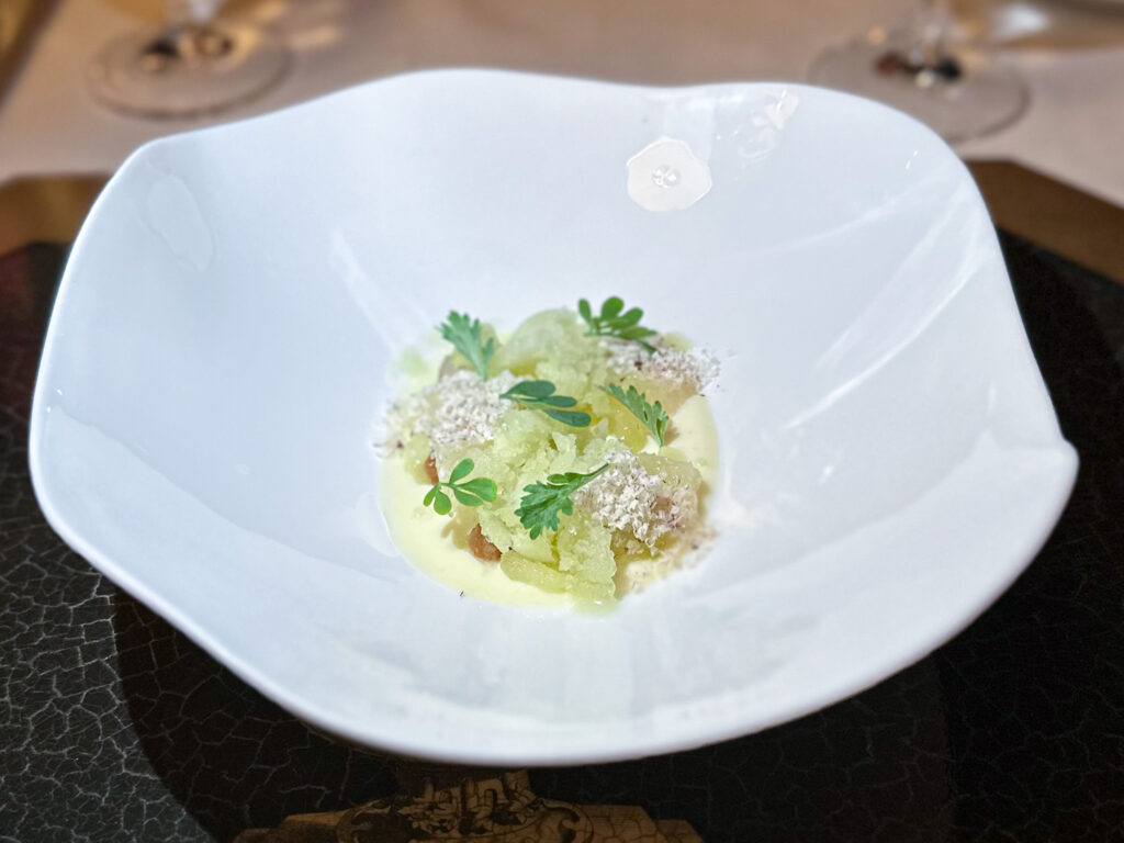 Budino di mandorla, crema di pompelmo grigliato, granita di verdure dello chef Stefano Baiocco.
