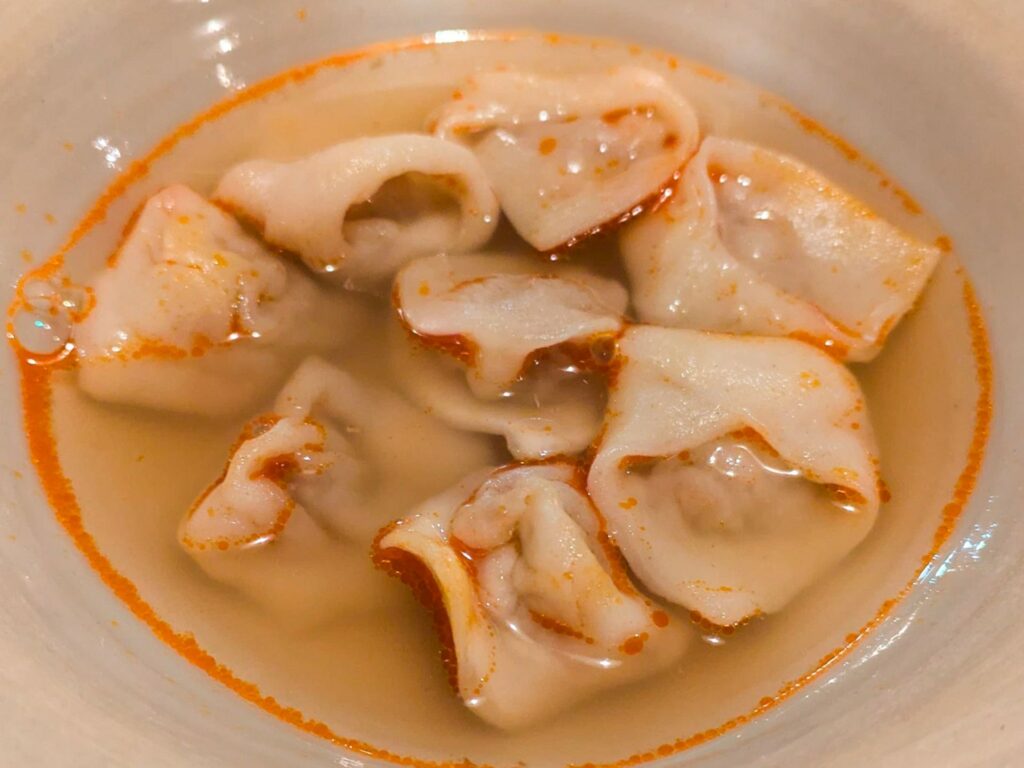 Dumpling di maiale, brodo speziato, habanero e grasso di 'nduja.