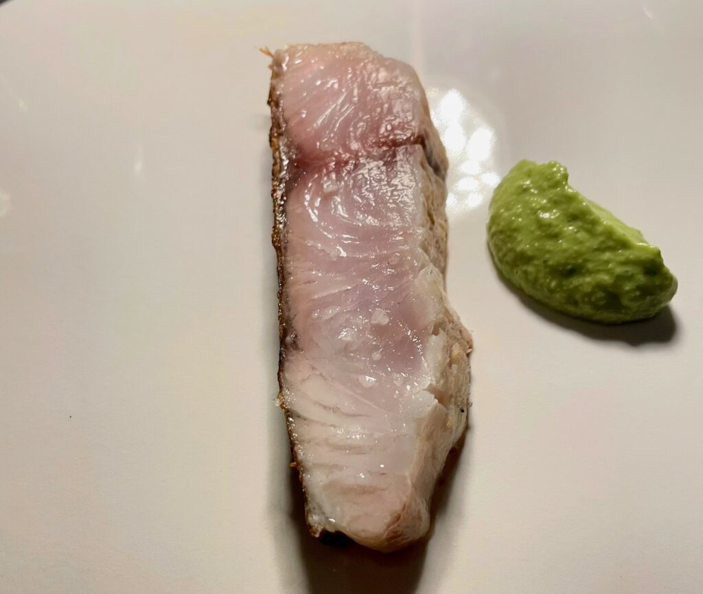 Spigola cotta alla perfezione del ristorante Il Cappero