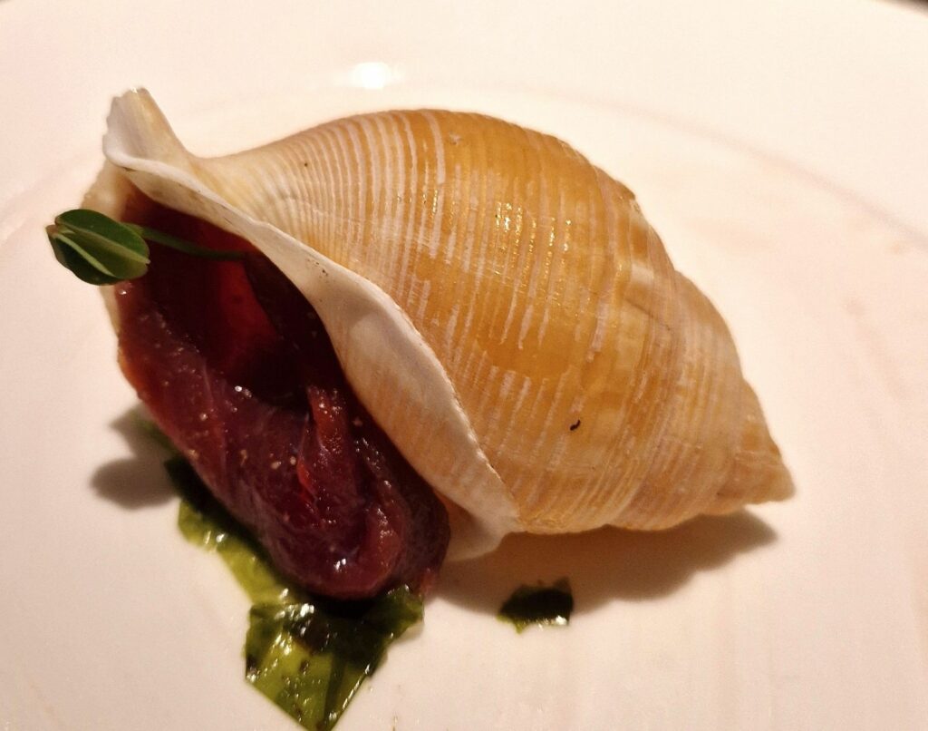 Petto di anatra maturata nelle alghe, misto di pepi della trattoria da lucio