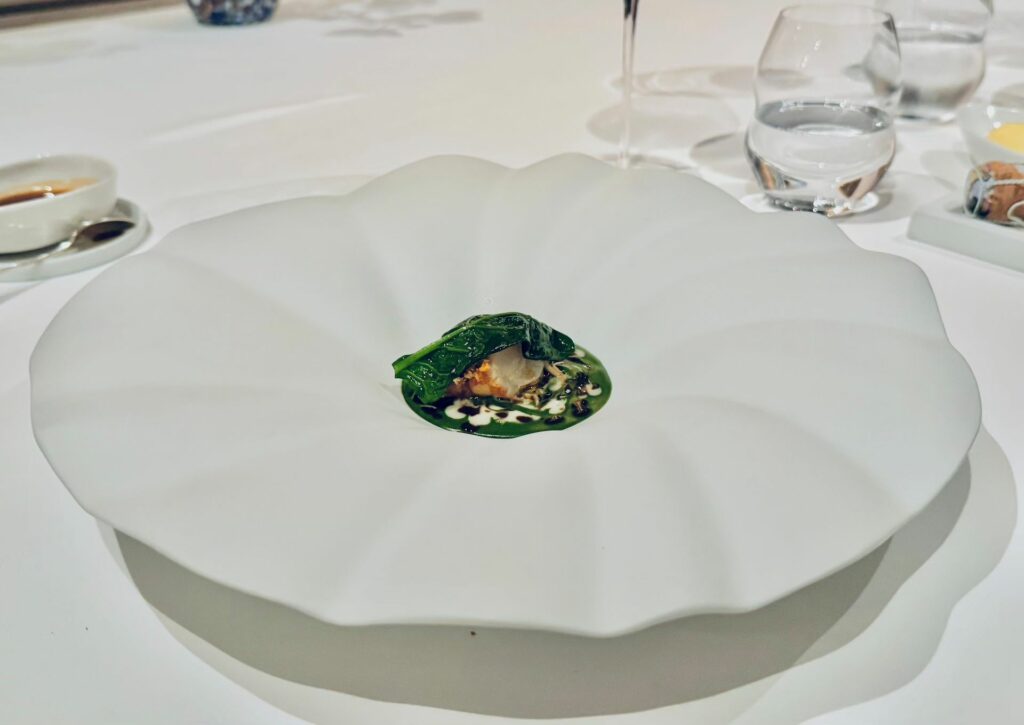 Astice, spinaci e burro acido dell'imàgo raccontato nella nostra recensione