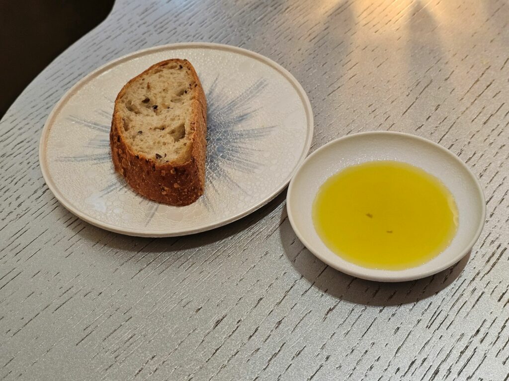 Il servizio del pane e dell'olio di Kei.
