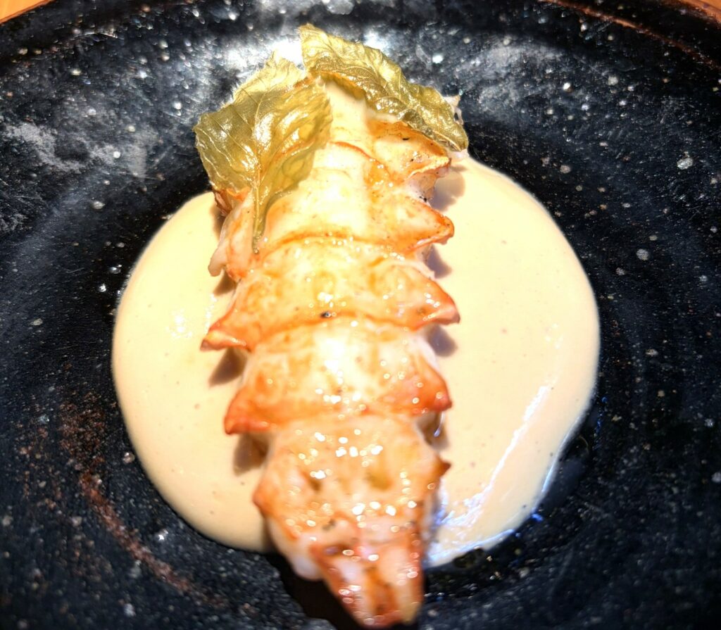 scampi confit, rosa e semi di girasole di ekstedt