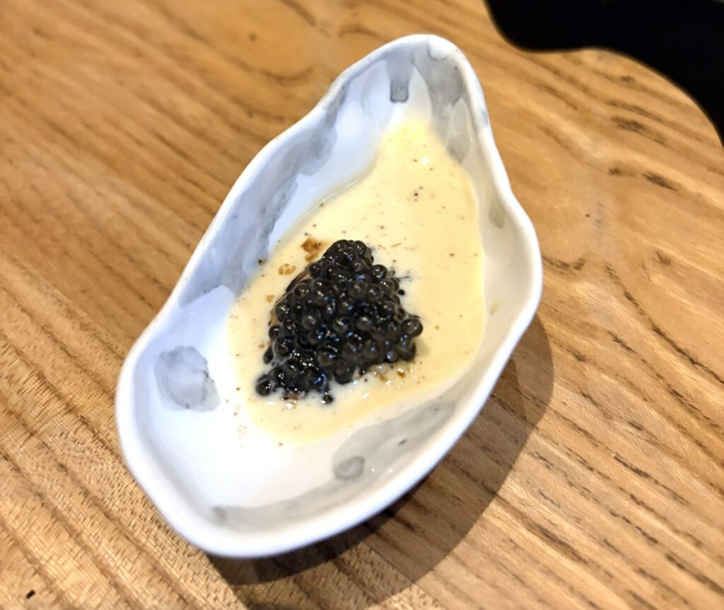 ostriche gigas selvatiche alla flambadou e caviale di storione