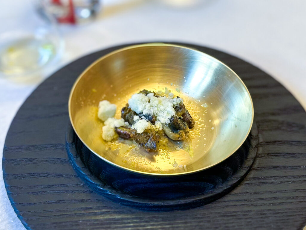 Lumache, pistacchio e pomodoro