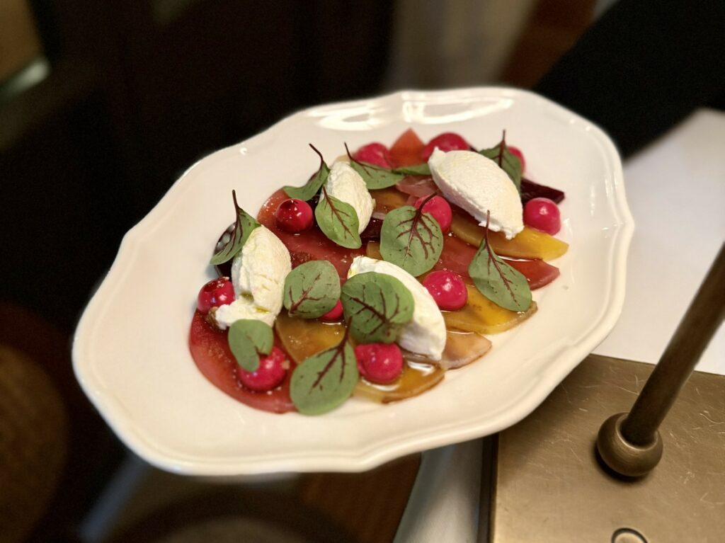 Carpaccio di rape al carbone, ricotta di mandorla, aceto balsamico.